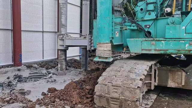 Boring pile work processes on construction sites involve large boring machines drilling into the earth to create foundations&nbsp;for&nbsp;buildings.