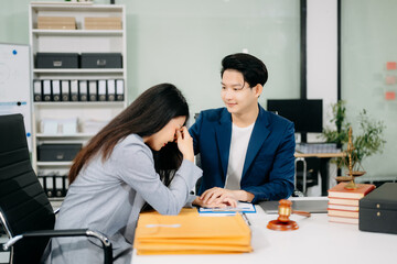 Judge gavel with scales of justice, Business and lawyer or counselor consulting and discussing contract papers