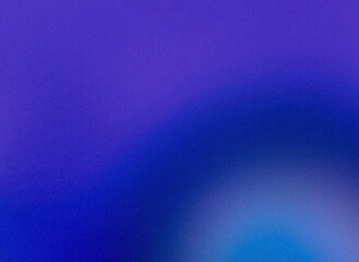 The photo shows a blurred, mostly blue background with a small, lighter blue circle towards the bottom.
