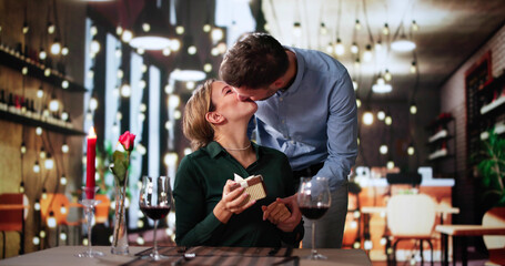 Romantic Couple Sitting Having Dinner