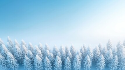 Obraz premium A snowy forest with a blue sky in the background