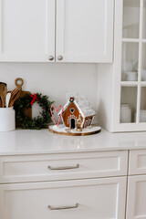 Gingerbread House in a White Kitchen