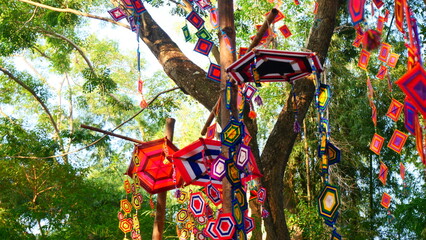 A hanging ornament resembling a spider web from the Karen tribe in Thailand, believed to be a...