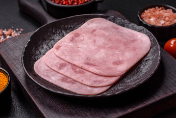 Boiled ham with salt and spices cut into slices