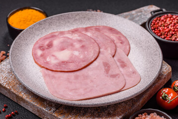Boiled ham with salt and spices cut into slices