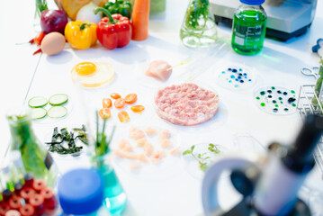 Explore a modern food science lab with fresh samples, test tubes, and microscopes. Ideal for biotechnology