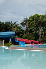 Red and blue slides at water park