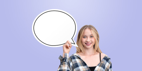 Woman holding a blank speech bubble on a purple background.