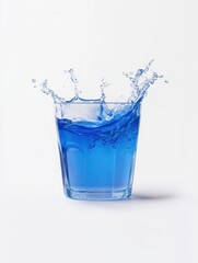 Splashing blue drink in glass studio setting beverage photography clean background close-up view refreshing concept