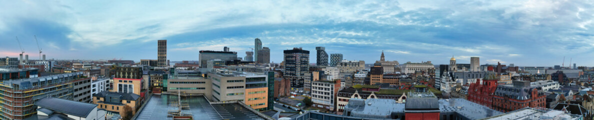Obraz premium High Angle Ultra Wide High Resolution Panoramic View of Historical Liverpool City of England During Orange Sunrise Moring Time. Drone's Camera Footage on November 11th, 2024 from Medium High Altitude