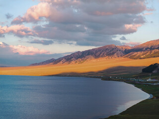 The beautiful scenery of Sayram Lake, coastal mountains, and grasslands in Xinjiang, China on September 4, 2024