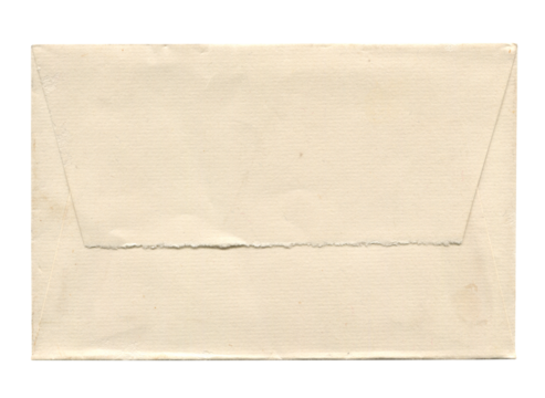 front view of old closed aged paper envelope isolated on white