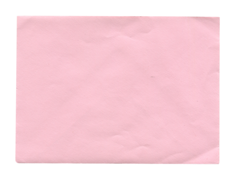 back view of old closed aged pink paper envelope isolated on white