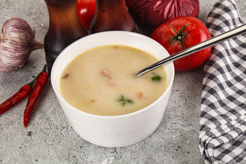 Salmon cream soup with vegetables