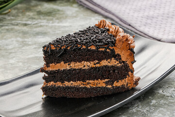 Chocolate cake piece with cream