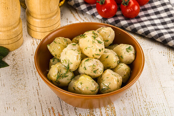 Young boiled mini potato with dill