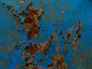 Close-up rusty iron surface, perfect for abstract vintage backgrounds. Metal corrosion is caused by...