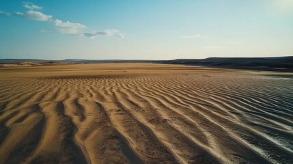 A breathtaking view of a serene desert landscape. The golden sand ripples under a vast blue sky. This image captures tranquility and the beauty of nature. Generative AI.
