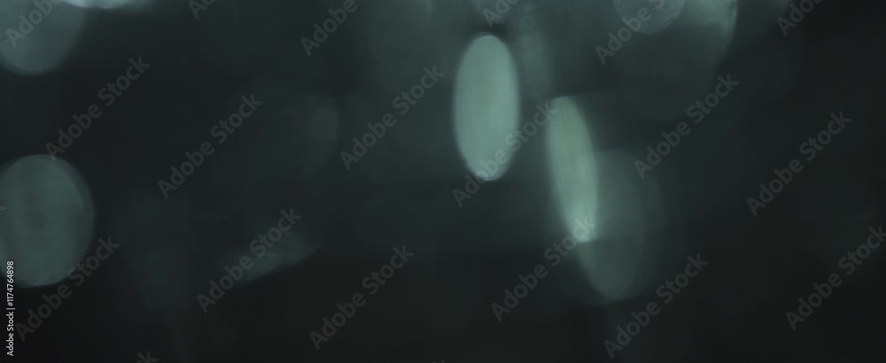 Poster mysterious abstract light orbs creating dreamy bokeh atmosphere in cool tones
