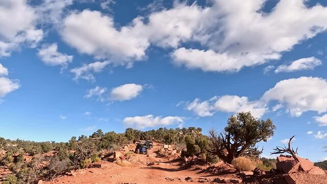 Kanab Utah ride steep desert mountain recreation trail P. Off road trail riding in 4x4 all terrain vehicle for sport and recreation. Desert landscape, dusty trails and recreation areas. Southwest Utah
