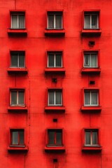 Obraz premium Red Building Facade With Many Windows