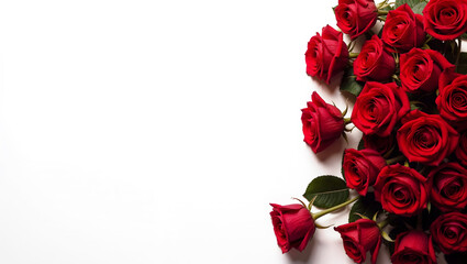 A beautiful arrangement of fresh red roses with green leaves is aesthetically placed on a plain white background with copy space. Perfect for Valentine greetings, love, 14 February background.