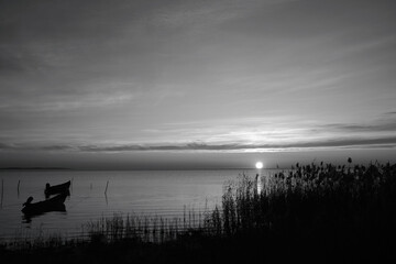 Winter morning on the Razim saltwater lake in the traditional fishing village of Sarichioi, one of the largest lakes in Romania, part of the Danube Delta Biosphere Reserve, Tulcea County, Romania