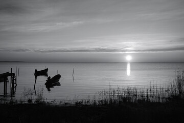 Winter morning on the Razim saltwater lake in the traditional fishing village of Sarichioi, one of the largest lakes in Romania, part of the Danube Delta Biosphere Reserve, Tulcea County, Romania