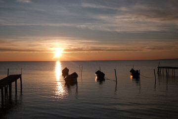 Winter morning on the Razim saltwater lake in the traditional fishing village of Sarichioi, one of the largest lakes in Romania, part of the Danube Delta Biosphere Reserve, Tulcea County, Romania