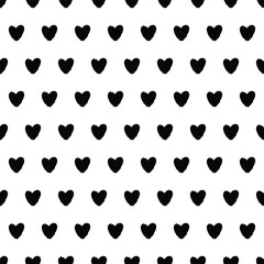 Small black textured hearts on white background, seamless vector pattern