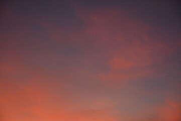 Blue evening sky and pink clouds on it