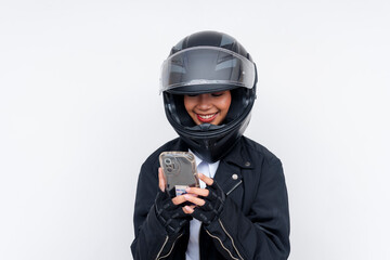 An enthusiastic young rookie Asian woman delivery rider in complete bike gear chatting with her...