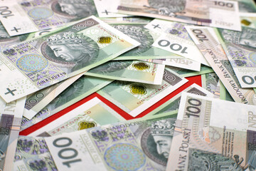 Value growth graphics. Red graph, Polish cash banknotes, one hundred zloty. Economics and business.
