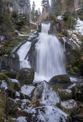 Long exposure view of a beautiful waterfall in the city of Triberg Germany