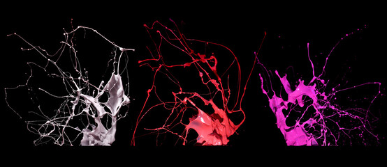 splash and splatter of paint isolated on black background