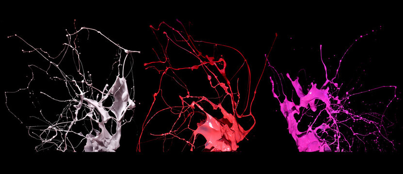 splash and splatter of paint isolated on black background
