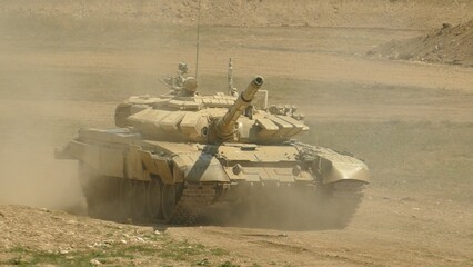 heavy tank in dust off-road
