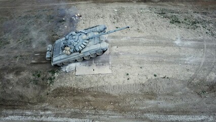 drone view - heavy tank overcomes wall obstacle
