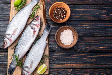 Raw sea bass fish photography . Top view
