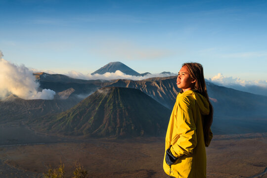 Woman standing in front of Mount Bromo, East Java, Indonesia