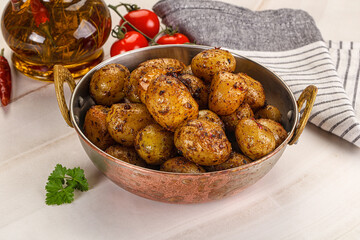 Baked mini potato with herbs