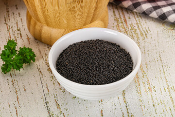 Black dry Nigella seeds in the bowl