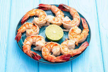 Grilled Tiger shrimps with lime photography . Top view