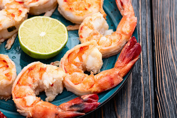 Grilled Tiger shrimps with lime photography . Top view