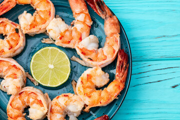 Grilled Tiger shrimps with lime photography . Top view
