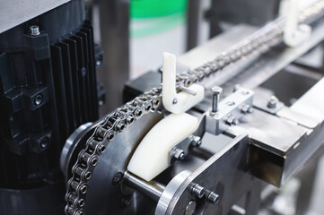 Stainless steel production elements in the production of conveyor equipment. Metal parts of future...