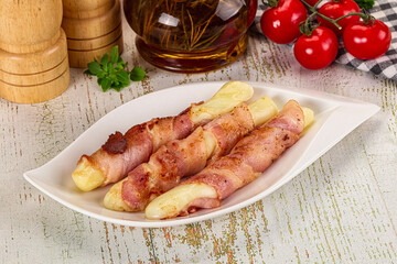 Hot mozzarella sticks with bacon