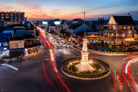 Monument and street intersection at dusk, Yogyakarta city, Java, Indonesia