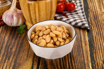 Baked white canned beans in the bowl