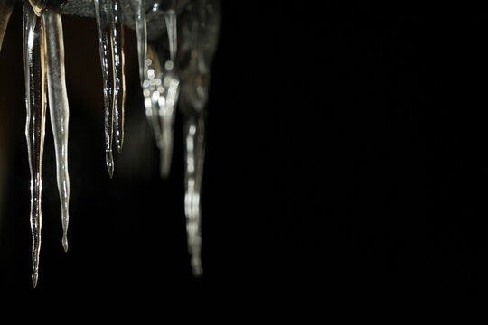 Icycles outside Kota Cabin in Lapland Finland on very cold icy winter night